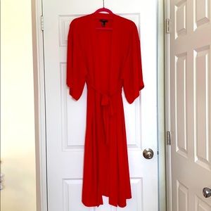 Sheer red robe.